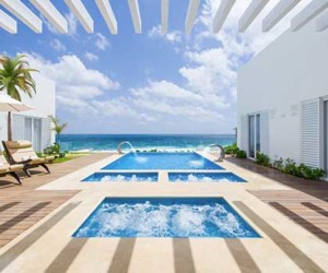 infinity pool on the beach in Cancun