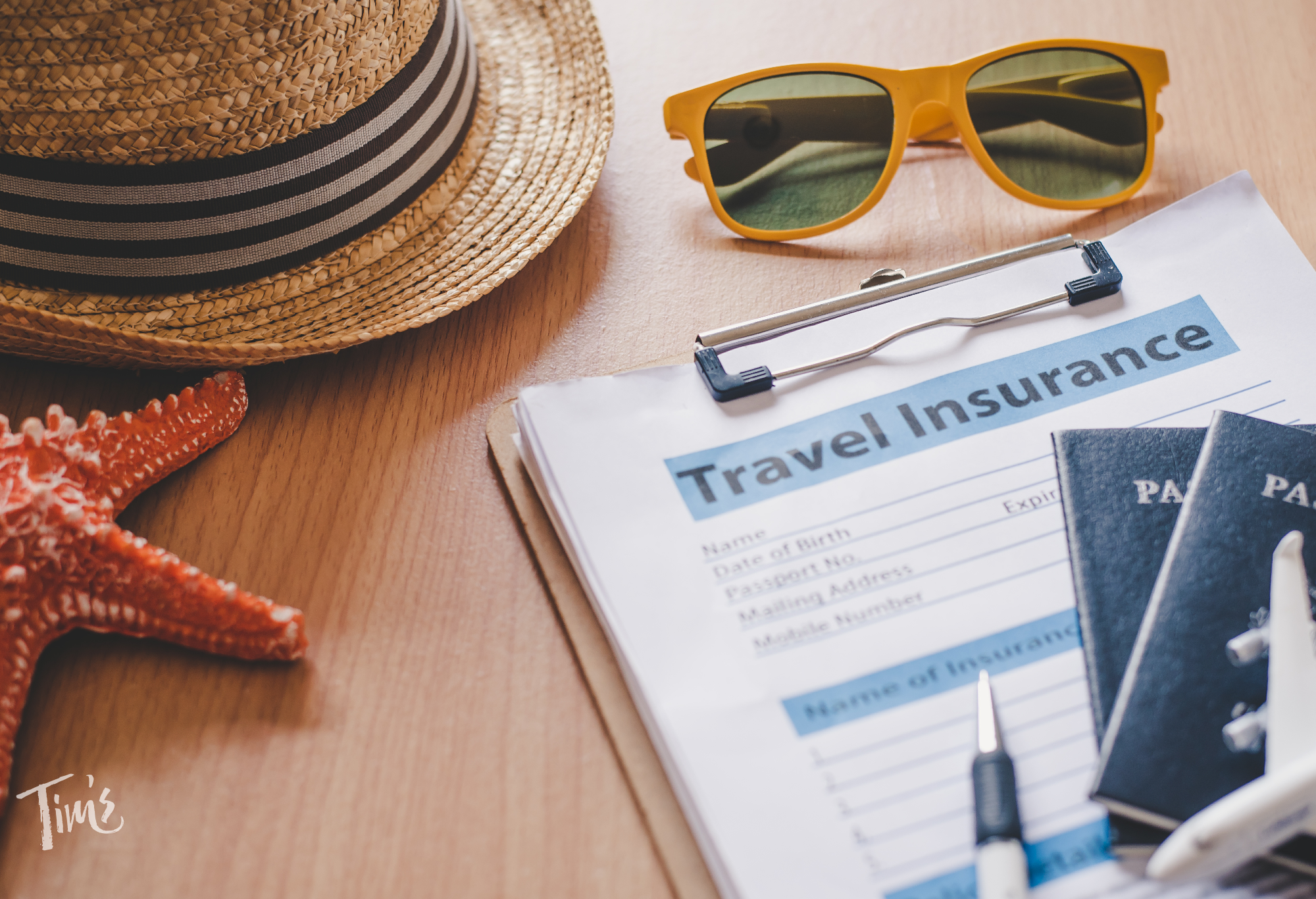 Guest reviewing travel insurance policy before Cancun vacation rental stay at Tim’s Ocean Condos.