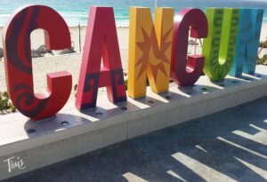 "Iconic CANCUN sign at Playa Delfines Beach, a popular tourist attraction near Tim's Ocean Condos."