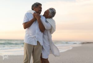 happy couple on beach in Cancun celebrating anniversary