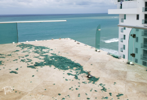 Blown-out glass on the terrace of an oceanfront penthouse at Tim’s Ocean Condos in Cancun after a hurricane.