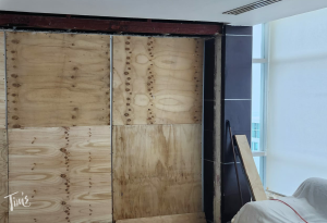 Tim’s Ocean Condos Penthouse 2000 with boarded-up windows and doors, prepared for Hurricane Helene in Cancun.