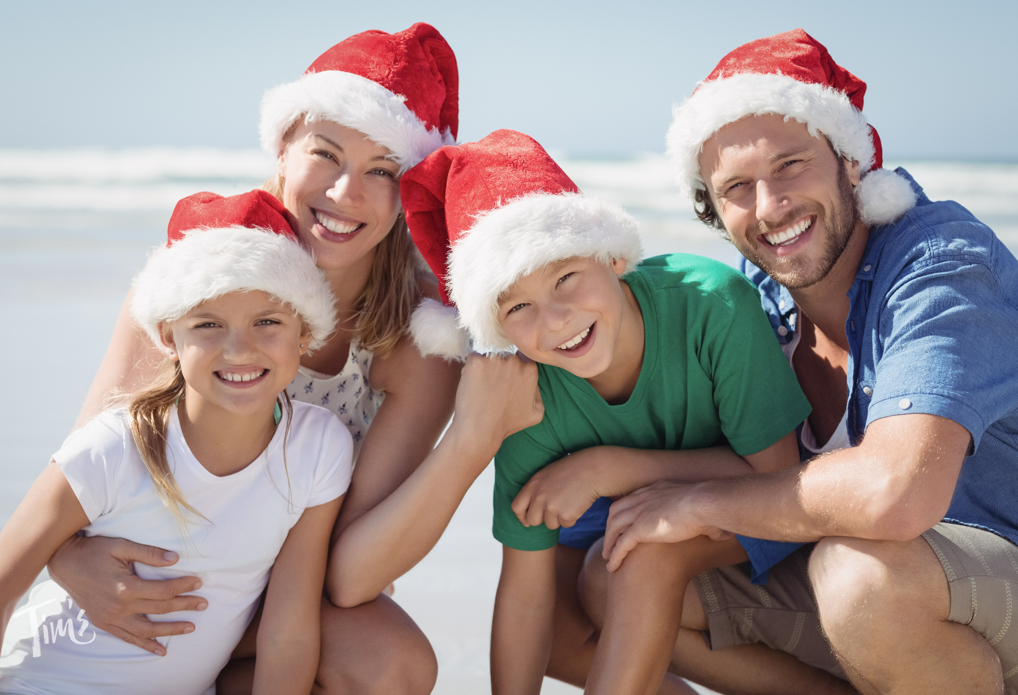 Family enjoying Christmas vacation rental in Cancun at Tim’s Ocean Condos