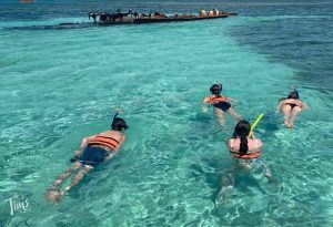 kids snorkeling Isla Mujeres with Mike in Cancun