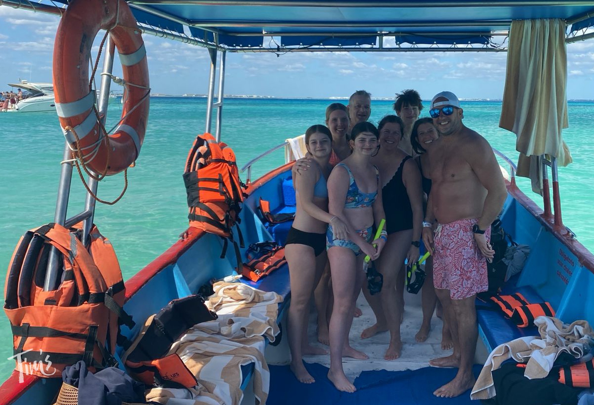 family on Mikes snorkeling boat Cancun Isla Mujeres after trip