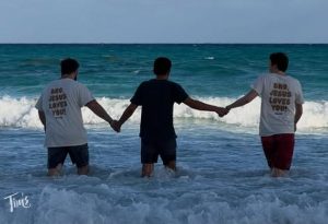 THE FOUR outreach team leading man into ocean for baptism in Cancun during spring break 2026