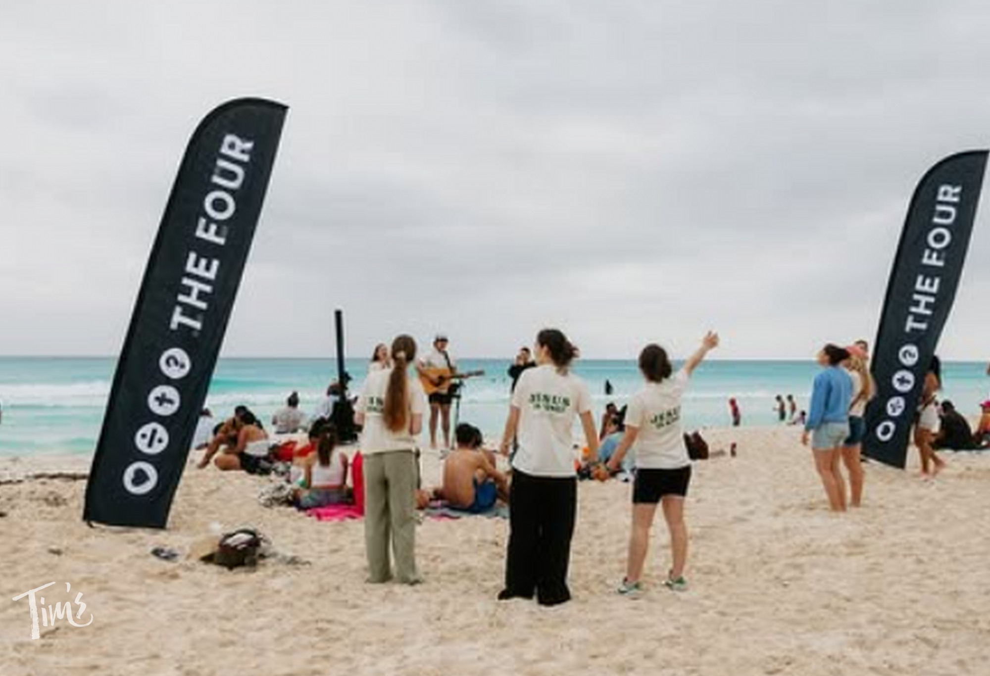 THE FOUR outreach team worshiping on the beach in Cancun during spring break 2026