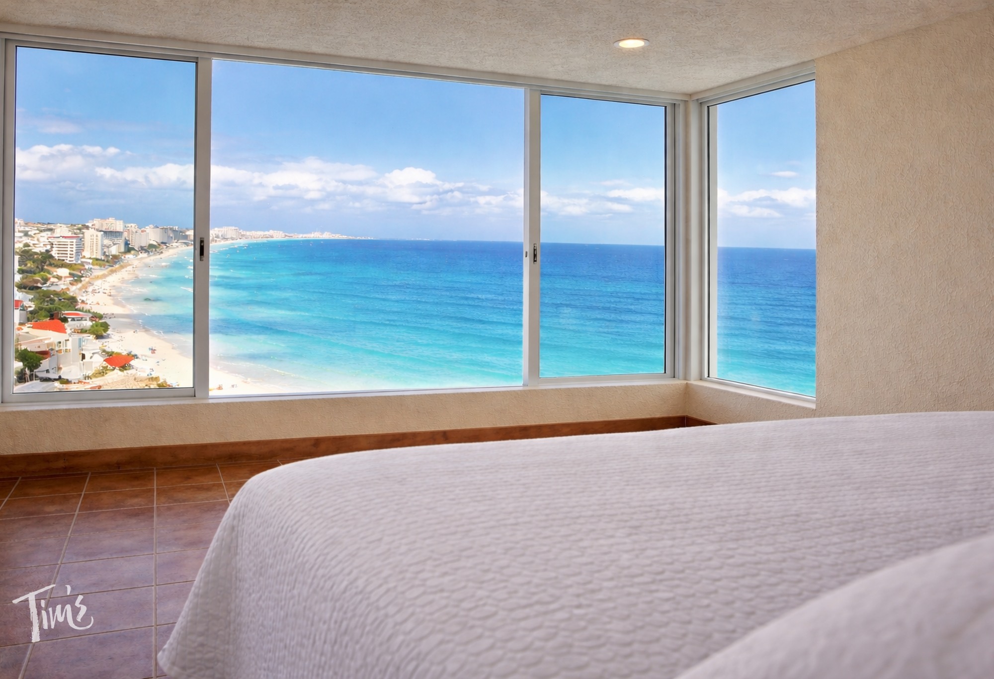 Upstairs bedroom with two queen beds and ocean view at Penthouse 3000 Tim's Ocean Condos vacation rental Cancun
