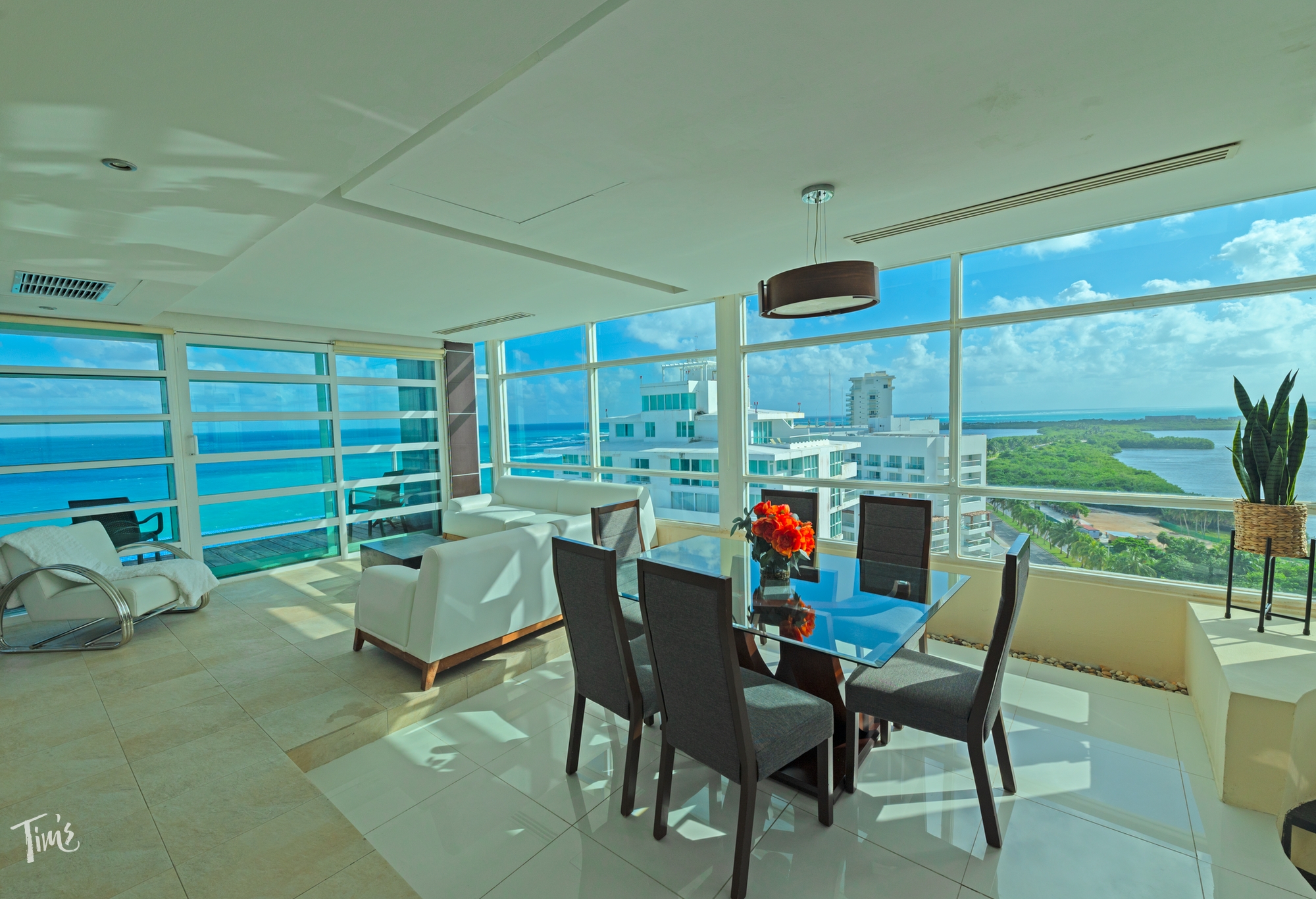 Large Cancun vacation rental with oceanfront living room and dining room at Tim's Ocean Condos
